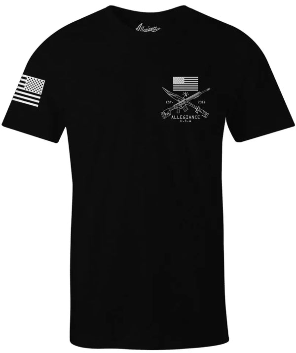 Front of Bravo Tee in black with small chest graphic and American flag sleeve print